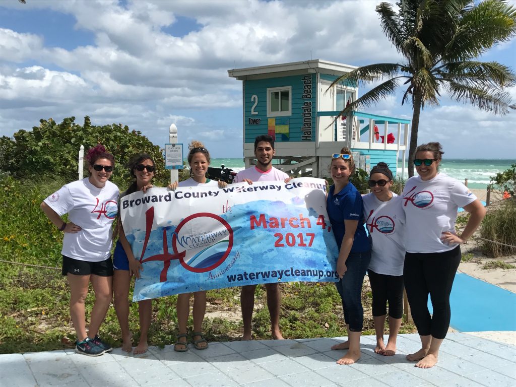 Volunteers-with-banner-Hallandale-beach-4-1024x768